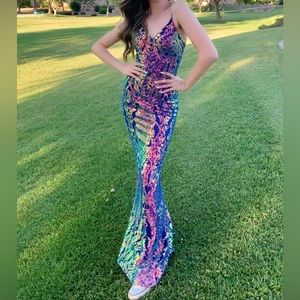 Beautiful shimmering blue Size 0 prom dress. In perfect condition worn once.